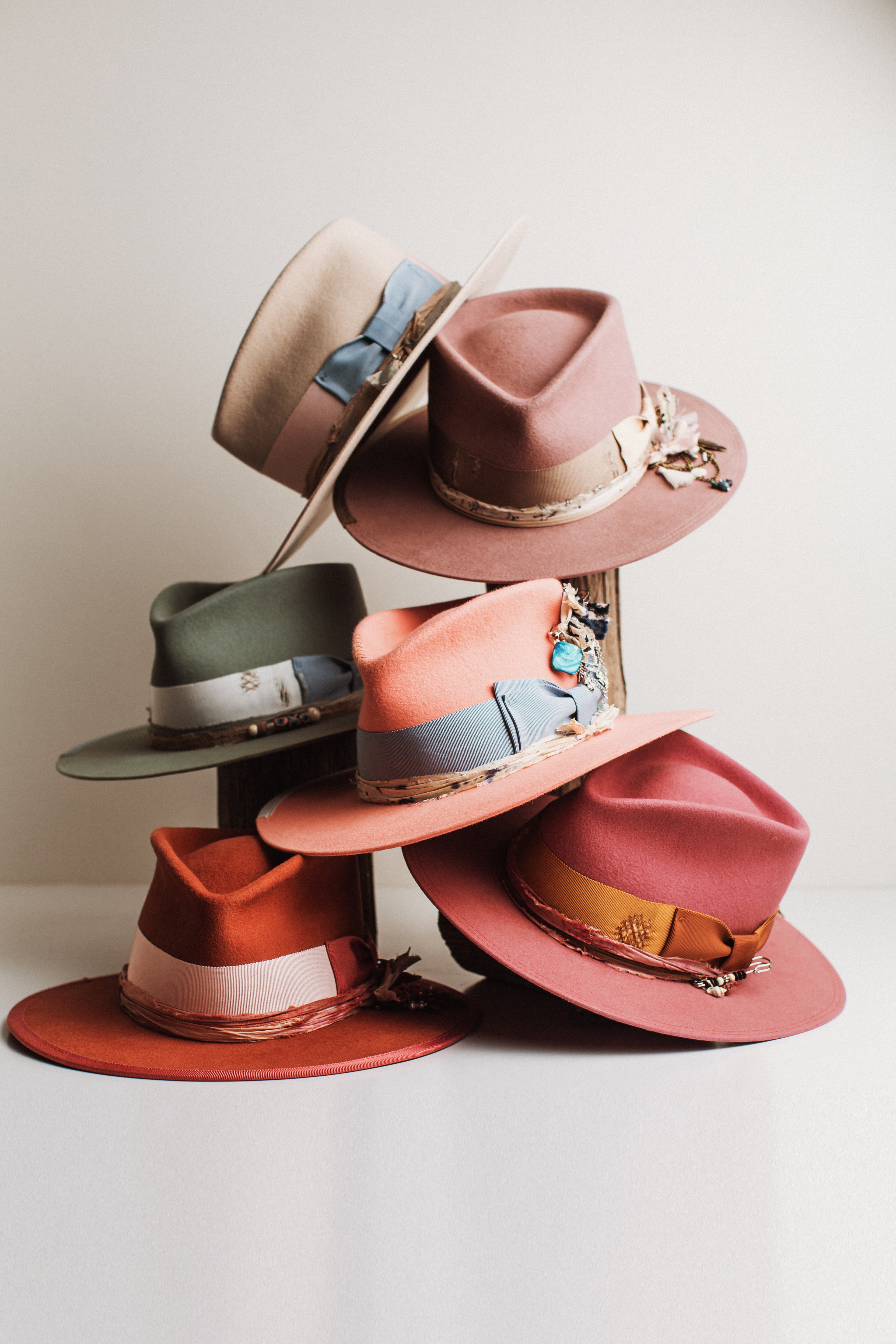 Bright and colourful collection of hats by PHYLLi Designs – group hat party experience with PHYLLi Designs