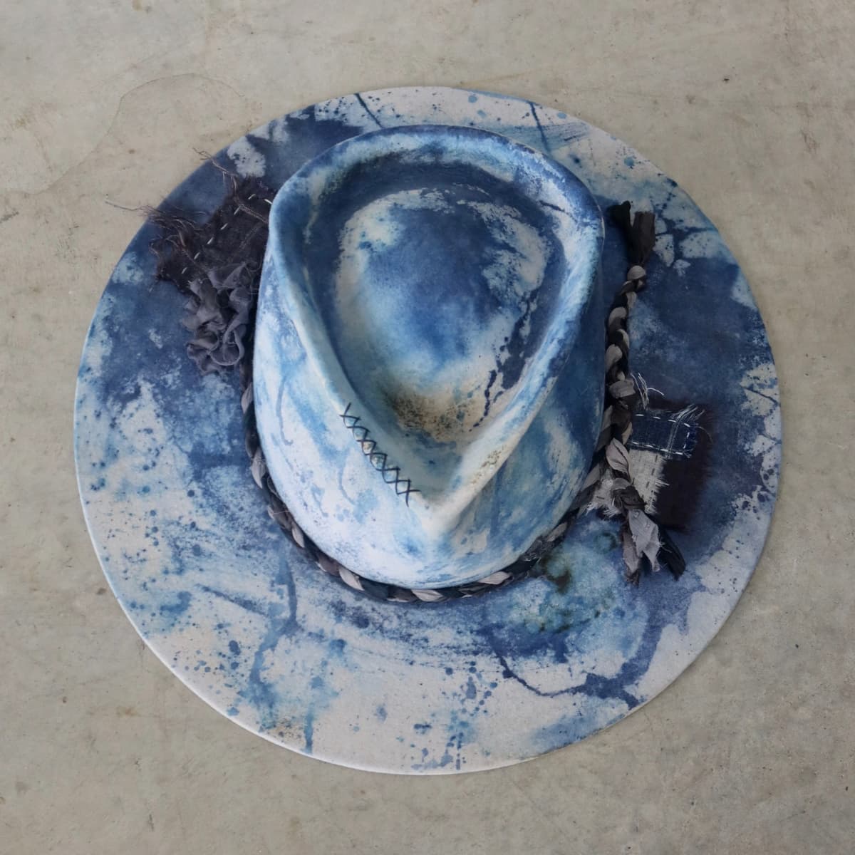 Top down front view of the dove grey indigo tie dye felt hat Aizome Limited Edition by PHYLLi Designs.
