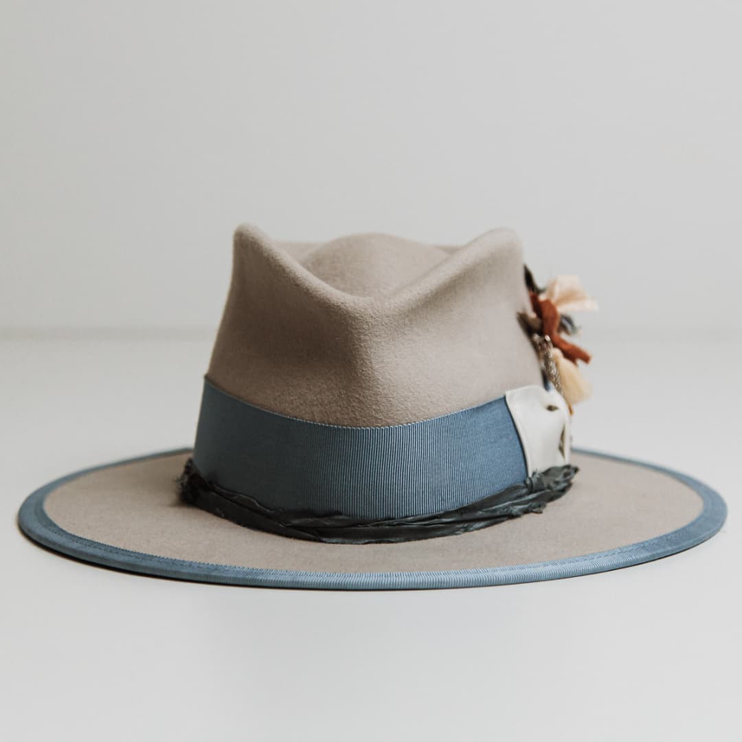 Bleu de France felt hat in Dove with Cornflower grosgrain band, Ivory bow and Smokey Blue sari silk trim.