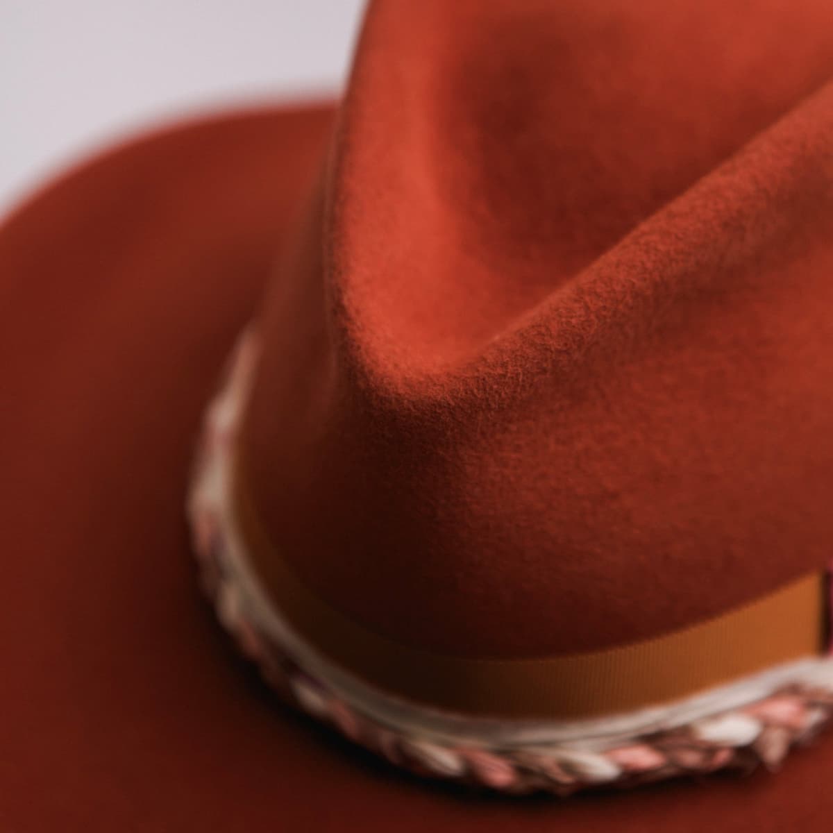 Close up detail of the Evans felt cowboy hat showing western weight rabbit felt in Spiced Pumpkin.