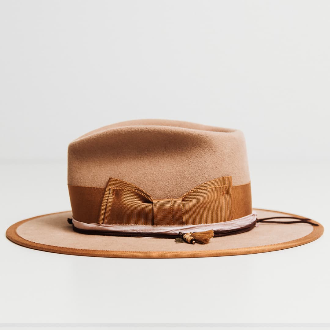Side view of Feuille Morte Camel felt hat with Copper grosgrain band and Rose sari silk trim.