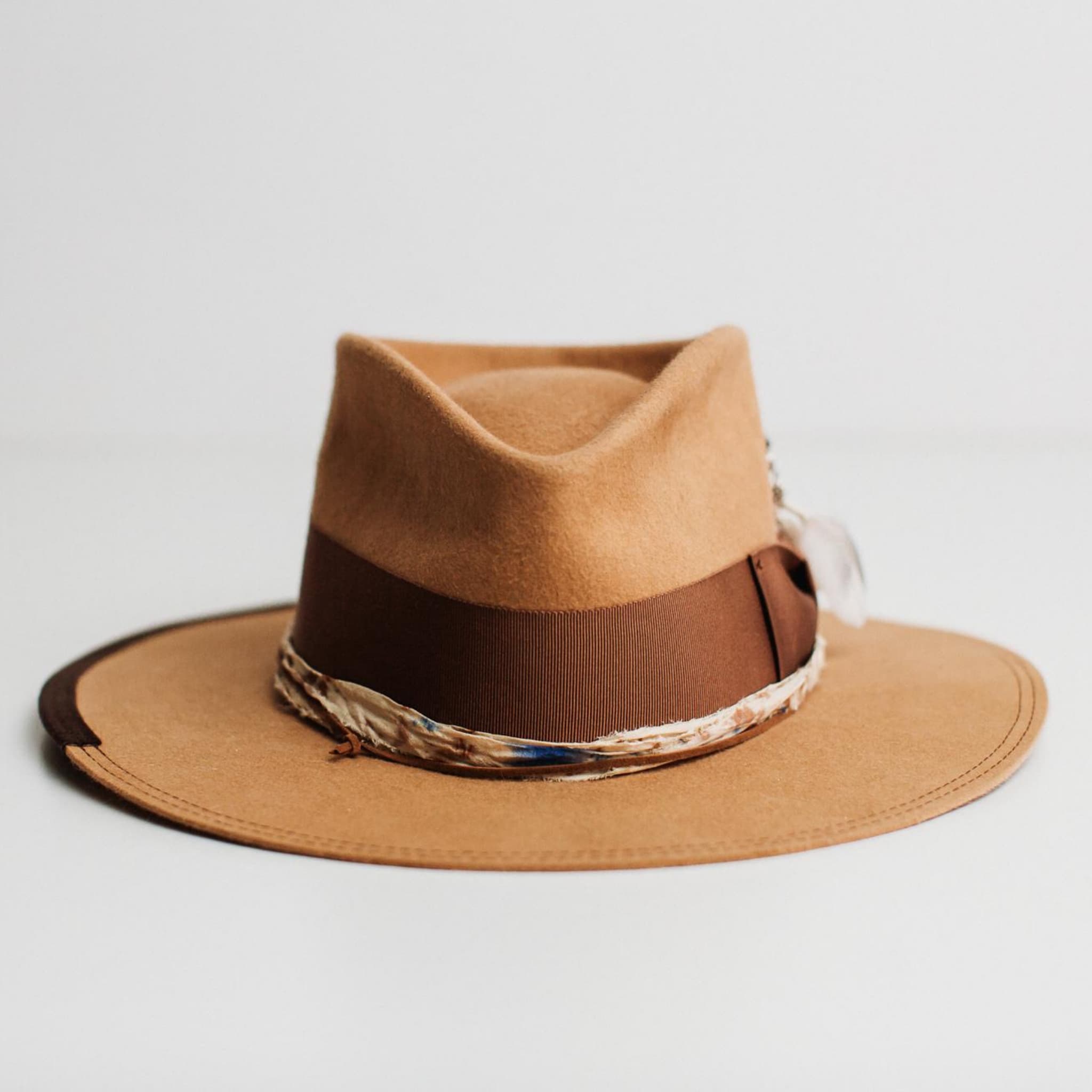 Front view of Fly Fisher camel felt hat by PHYLLi Designs with chocolate grosgrain band, dark brown brim trim and speckled sari silk trim on a light background.