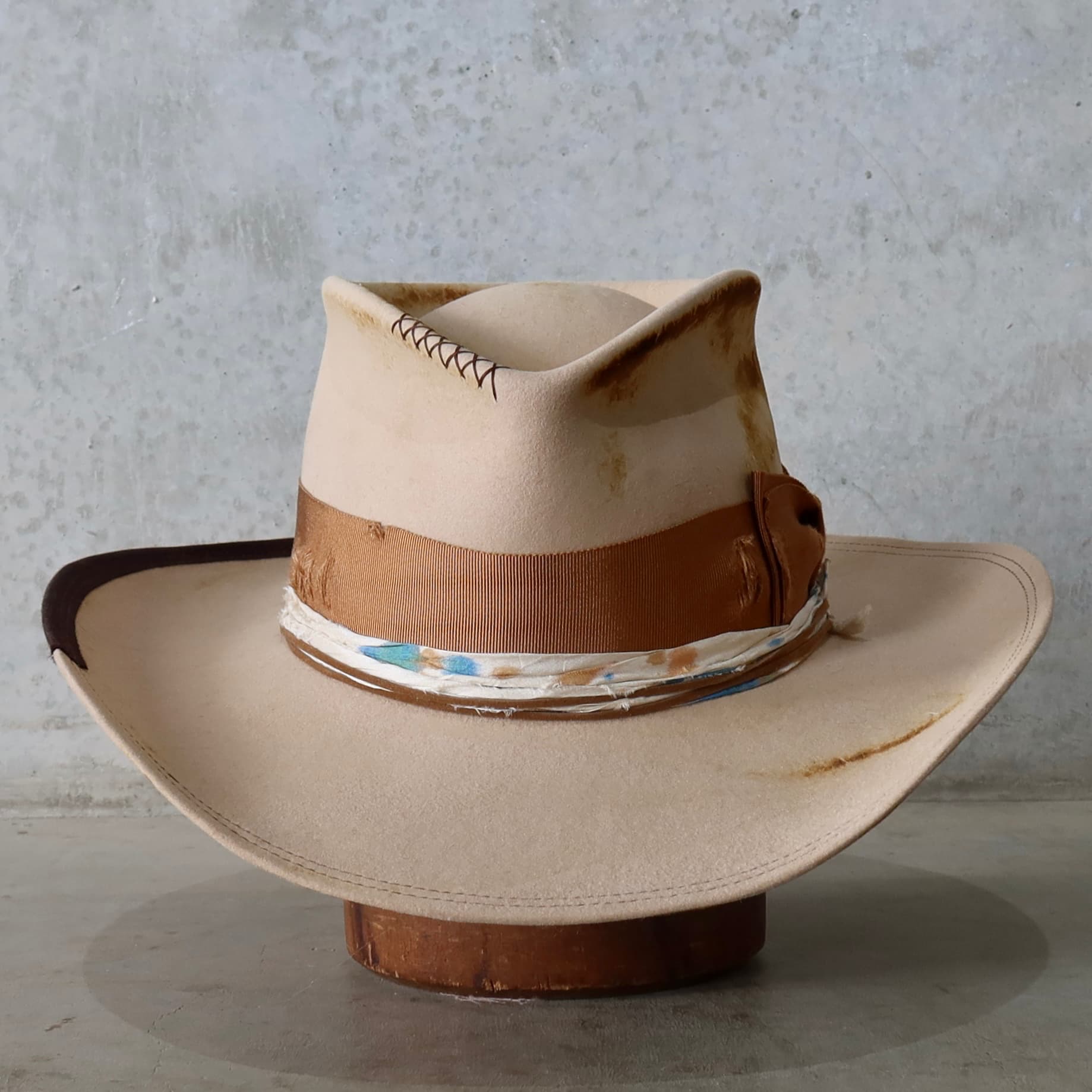 Sand cowboy hat Iluka by PHYLLi Designs with distressed copper double bow band and speckled sari silk trim.