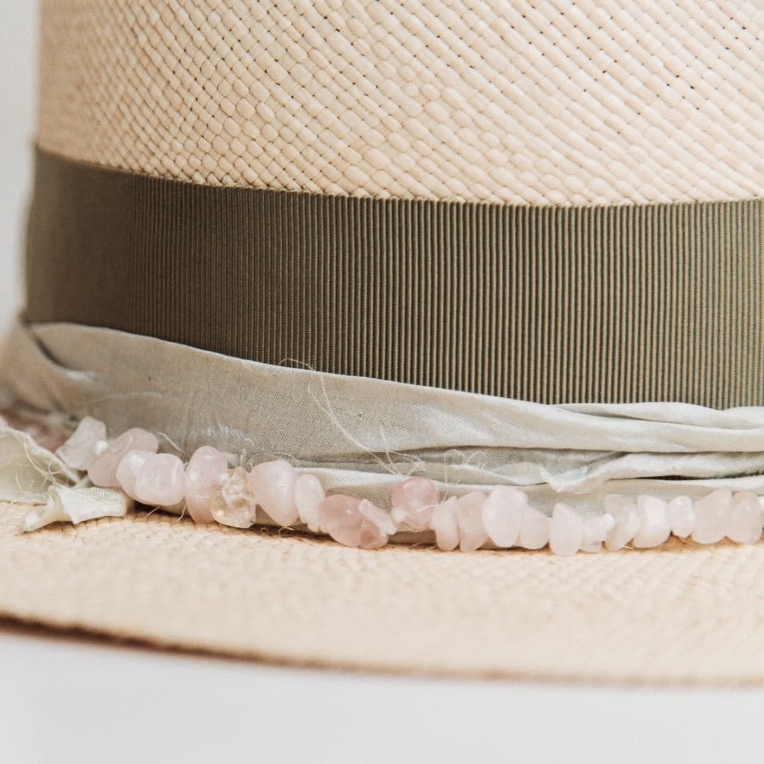 Close up detail of the Isle of Skye Panama hat showing mint sari silk trimming and oil green grosgrain band.