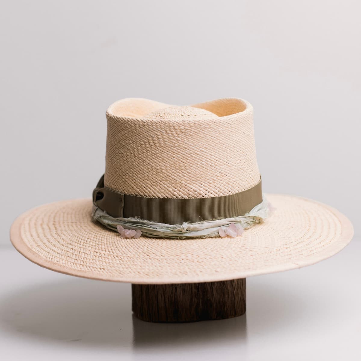 Back view of the Isle of Skye 2.0 Natural Panama hat by PHYLLi Designs featuring sand Japanese grosgrain brim trim.