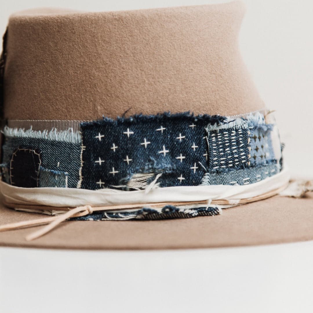 Close up detail of the Levi Limited Edition Sahara felt hat by PHYLLi Designs showing Wabi Sabi patchwork band with hand-stitched denim and linen patches.
