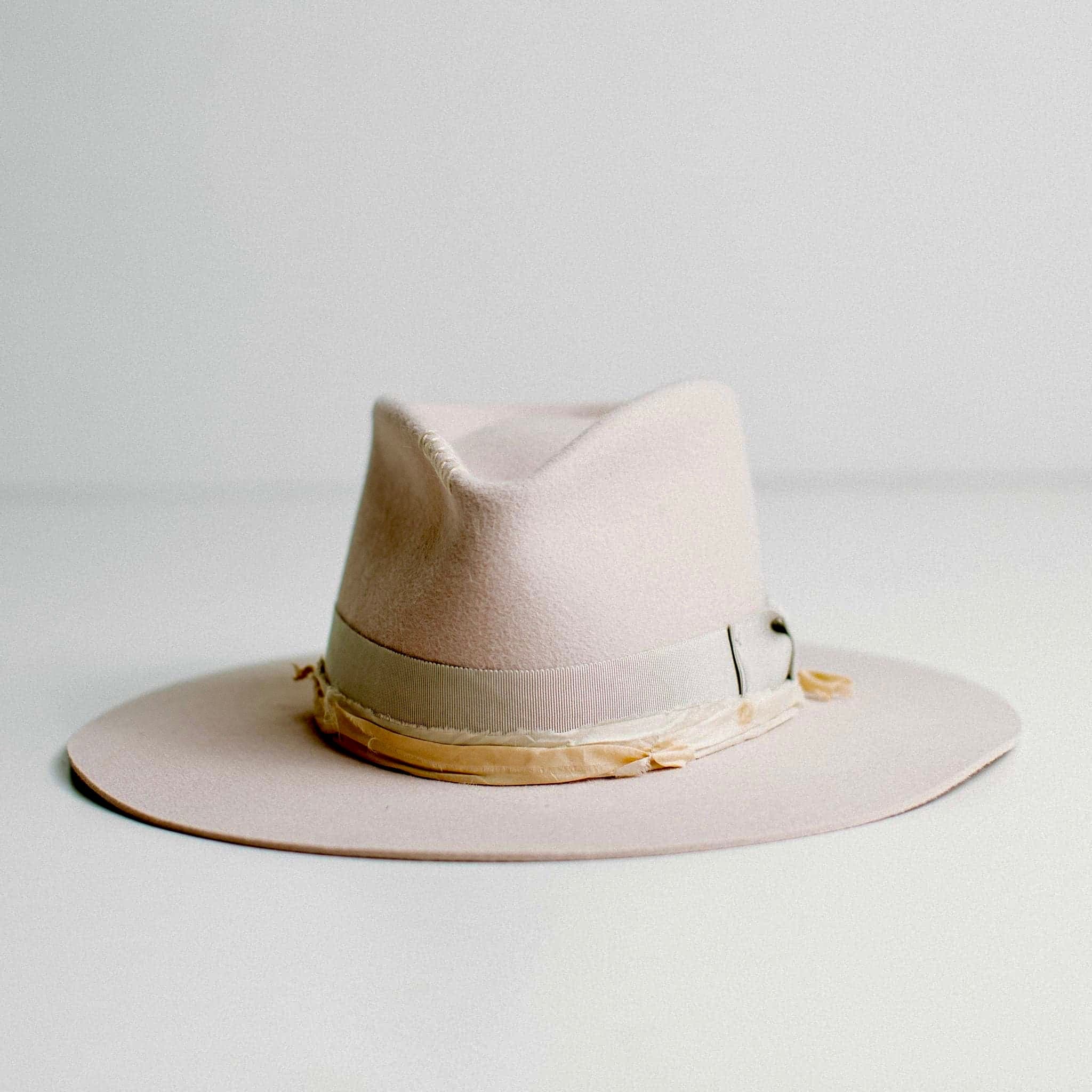Lilac Fields light lilac felt hat with dove grey vintage grosgrain bow and cream sari silk trim by PHYLLi Designs.