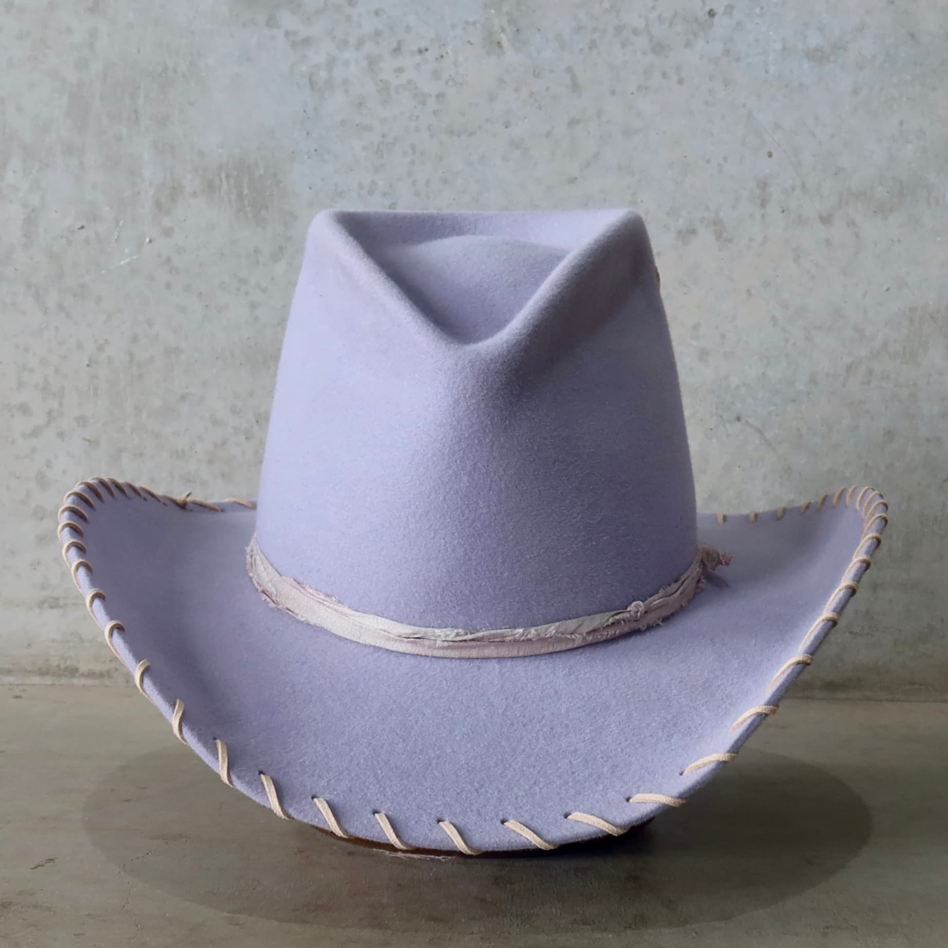 Lilac cowboy hat Nevada by PHYLLi Designs with tonal lilac silk yarn wraps.
