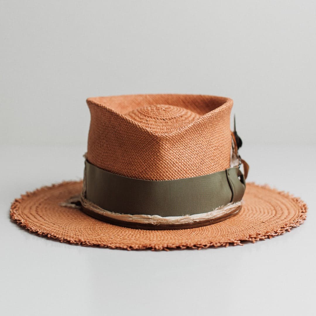 Nim Panama biscuit Panama hat by PHYLLi Designs with oil green Japanese grosgrain bow band, sari silk trimming and tan suede string.