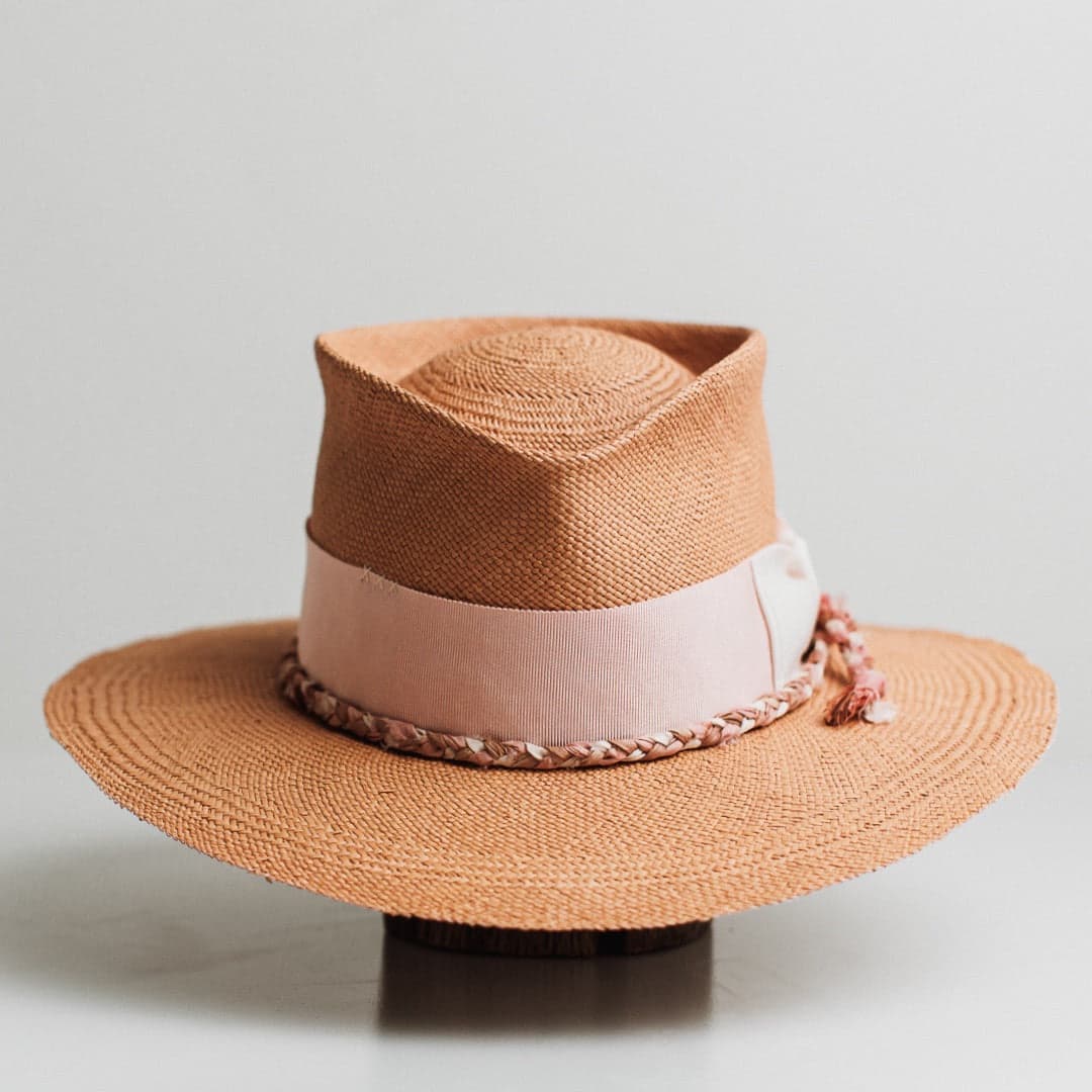Peach Panama biscuit Panama hat by PHYLLi Designs with floss pink Japanese grosgrain band, ivory bow and plaited sari silk trimming.