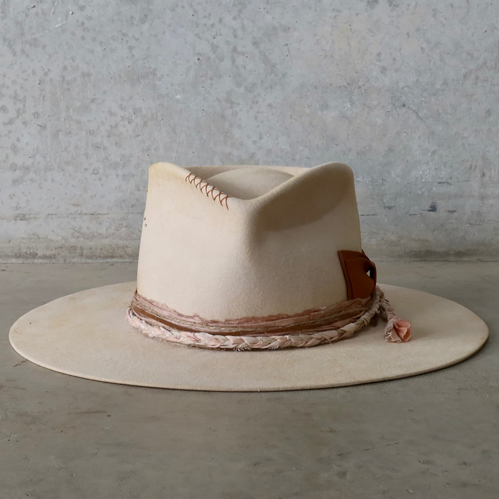 Beige distressed felt hat Starlight by PHYLLi Designs with copper Japanese grosgrain floating double bow and plaited sari silk trim.