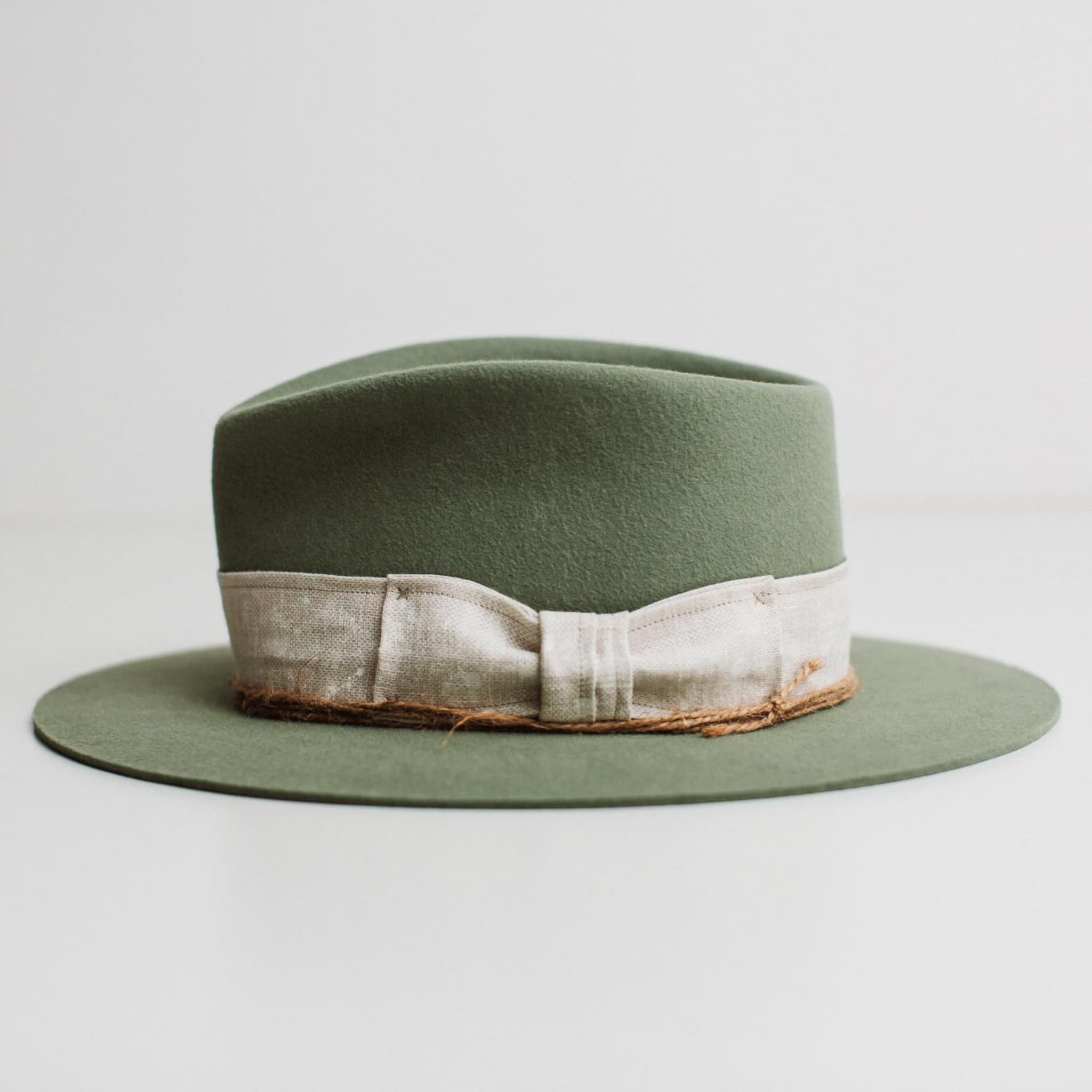 Left side view of The Fall eucalyptus felt hat by PHYLLi Designs showing linen bow band.