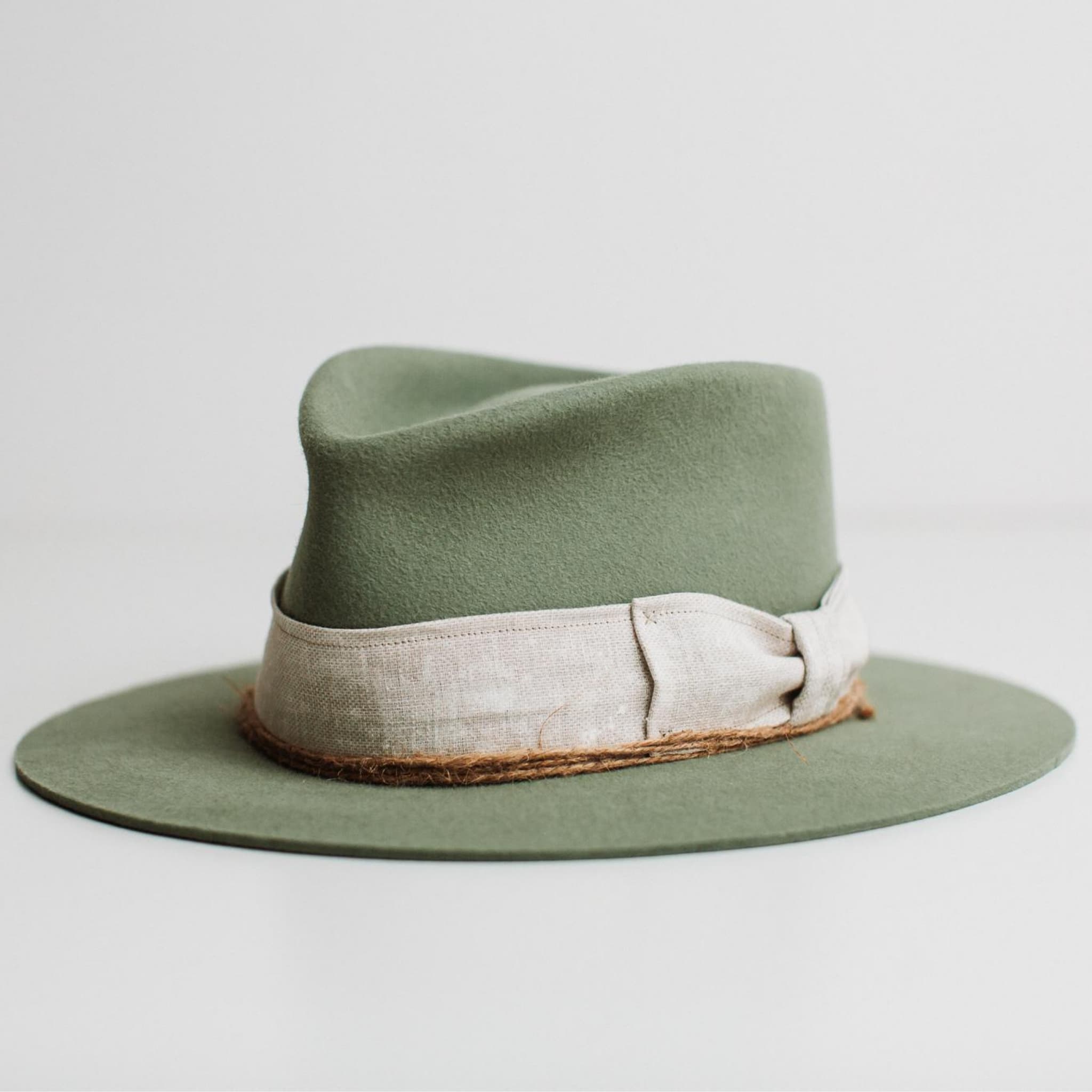 Front left angle of The Fall eucalyptus felt hat by PHYLLi Designs with linen band and twine wraps.