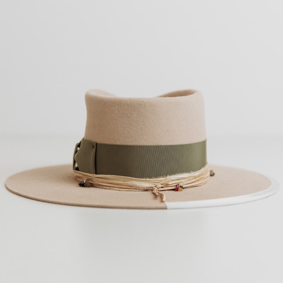 Back view of The Guardian felt hat by PHYLLi Designs with oil green grosgrain band and ivory brim trim.