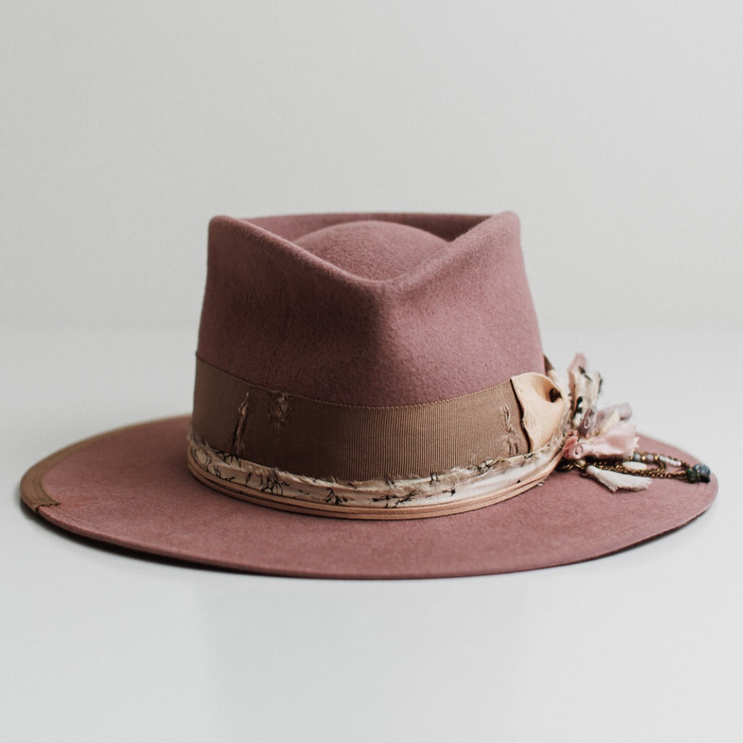Celia blush felt hat by PHYLLi Designs with distressed taupe Japanese grosgrain band, sand bow and black and white sari silk trimming.