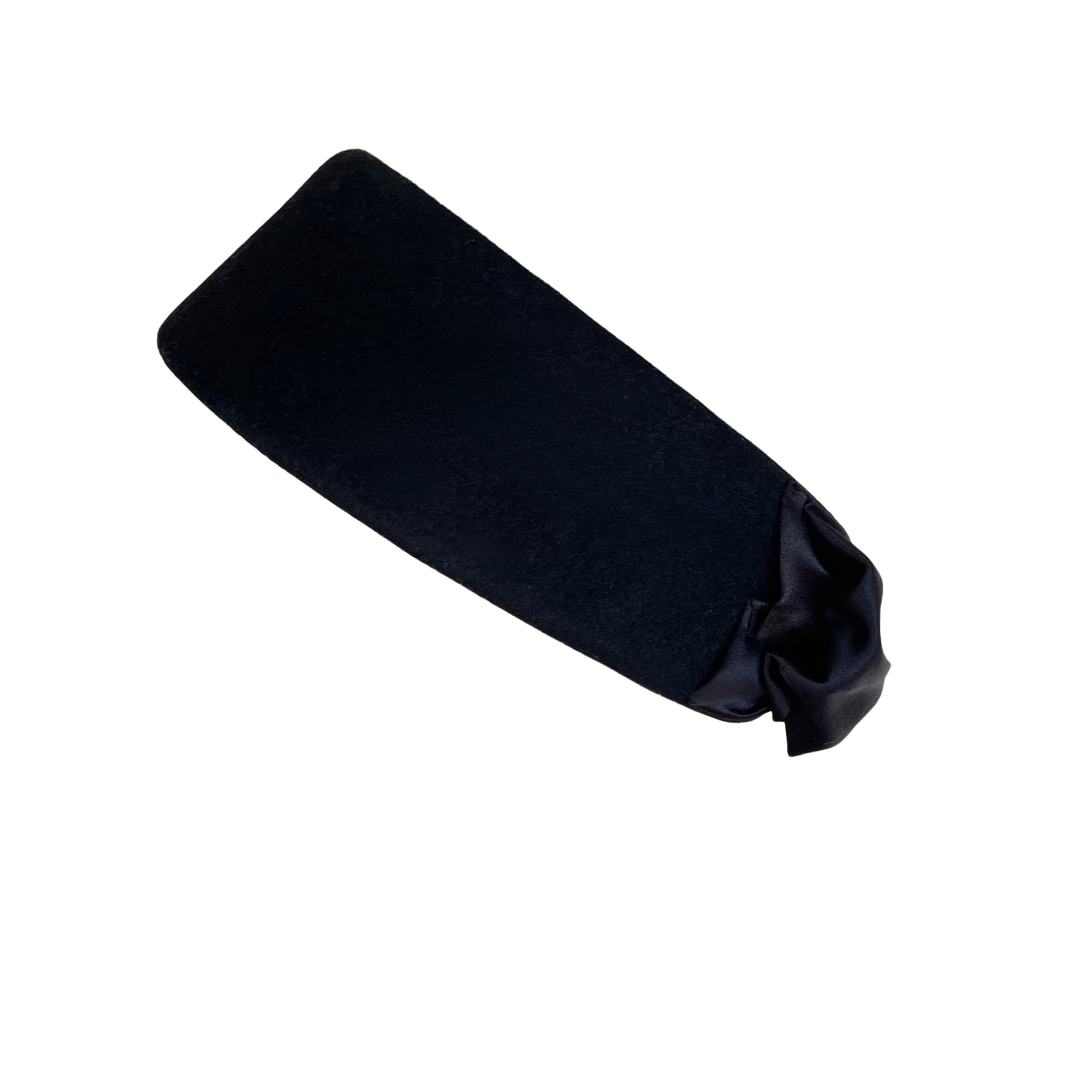 Left side view of the black felt pillbox hat Brooke Pillbox by PHYLLi Designs with Italian silk double bow trim.