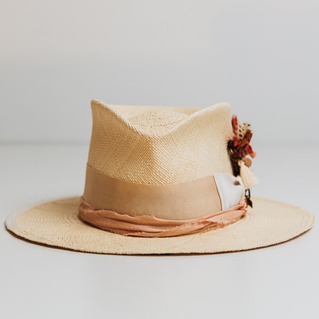 Calipso Panama hat in Natural handwoven toquilla straw with Sand Japanese grosgrain band and Melon sari silk trim.