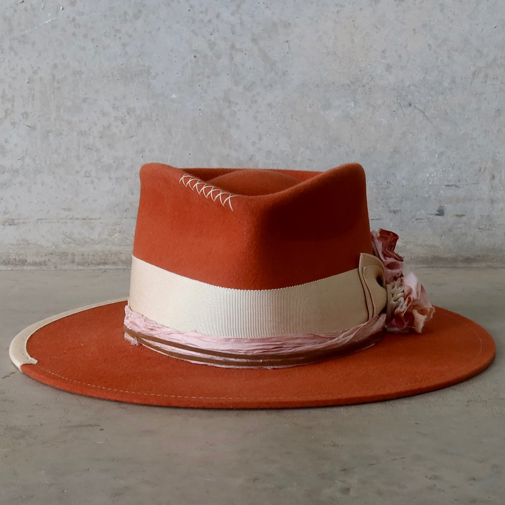 Spiced Pumpkin felt hat Canna by PHYLLi Designs with sand Japanese grosgrain double bow band and sari silk lapel blooms.