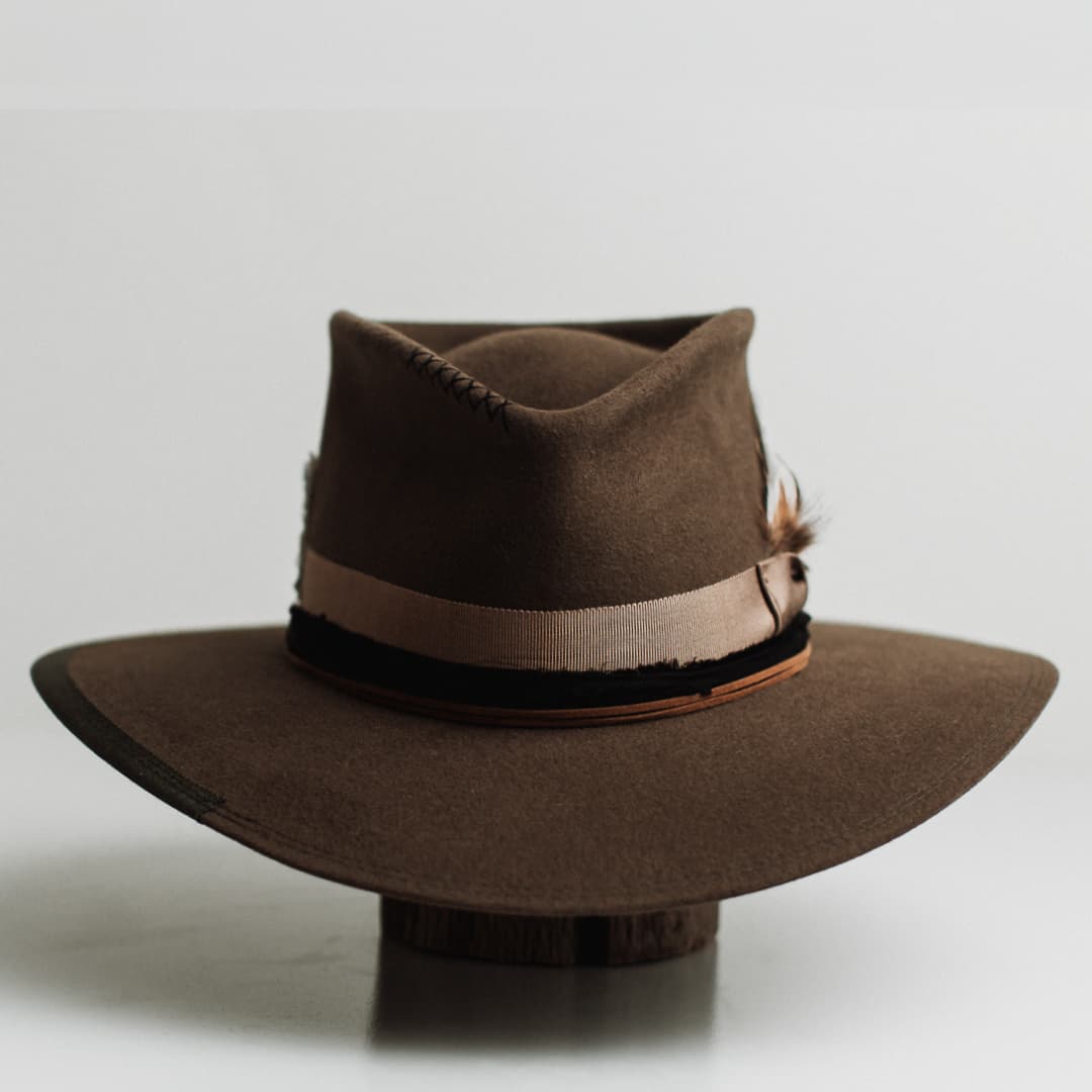 Dirty Jane dirty olive felt hat by PHYLLi Designs with taupe Japanese grosgrain ribbon band and tan suede string.