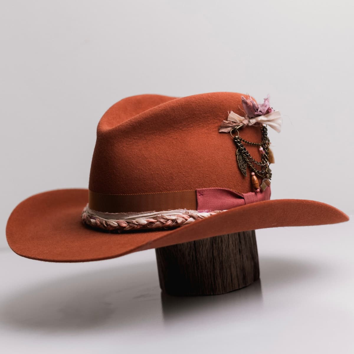 Spiced Pumpkin felt cowboy hat Evans by PHYLLi Designs with plaited sari silk trimming in salmon, cream and blush.