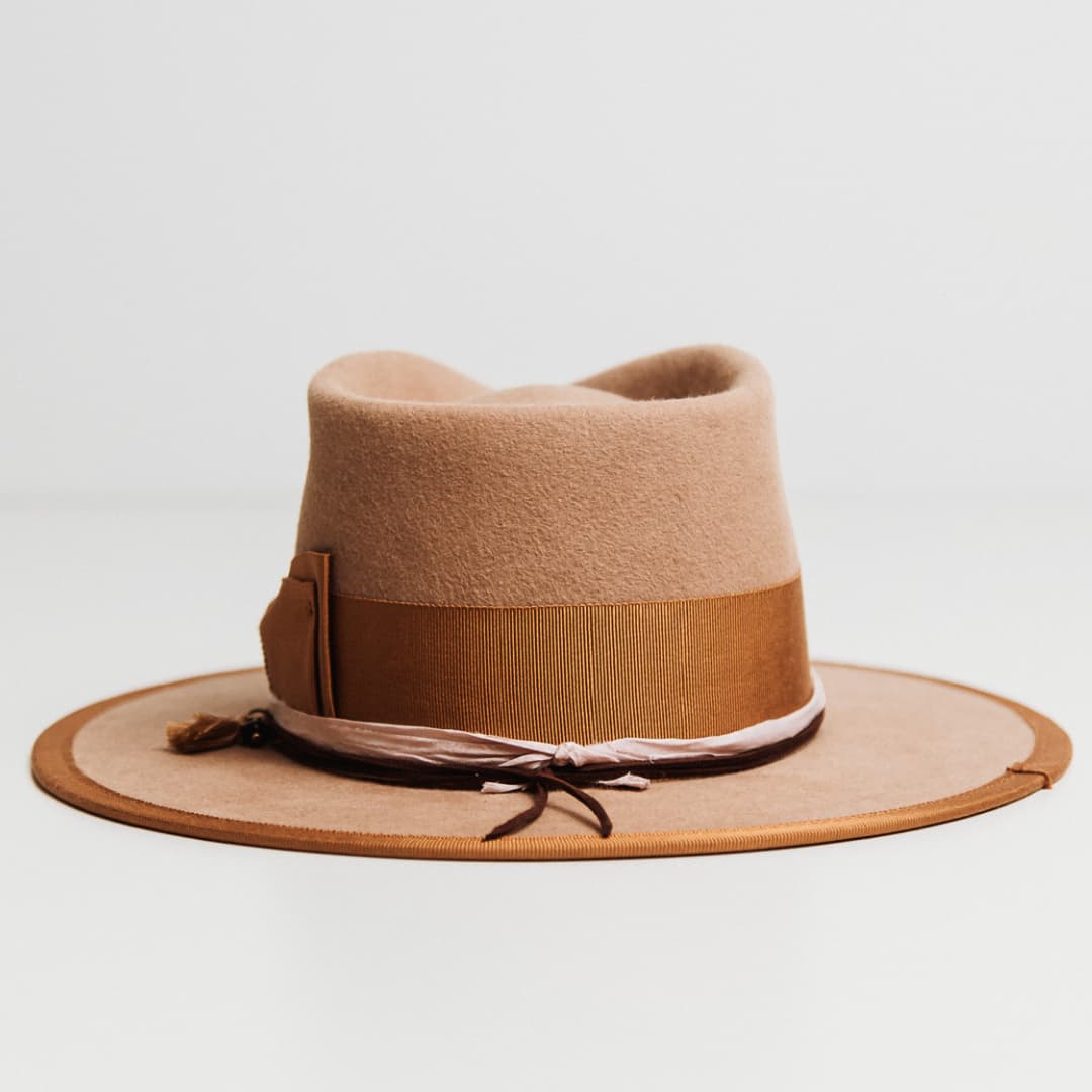 Back view of Feuille Morte Camel felt hat with Copper grosgrain band and Chocolate suede string.