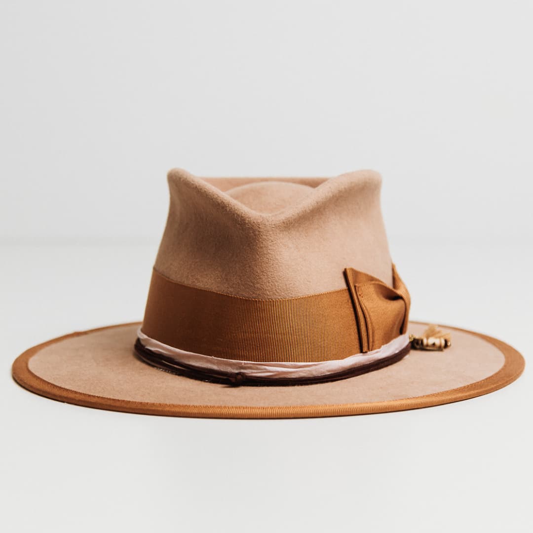 Feuille Morte Camel felt hat with Copper double bow grosgrain band, Rose sari silk trim and Copper brim trim.