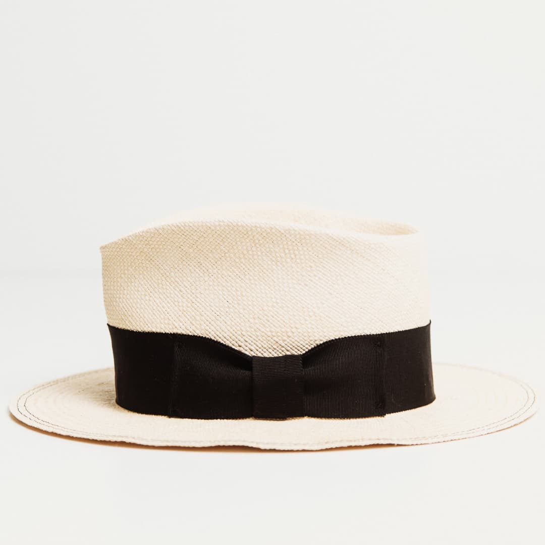 Side view of Holiday Natural premium Panama hat with Black Japanese grosgrain bow band.