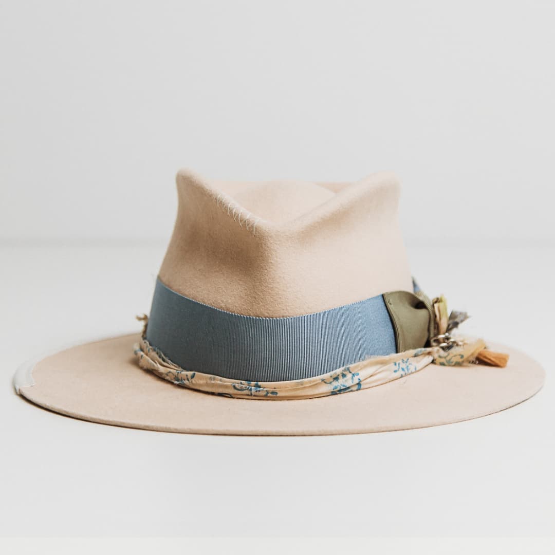 Hunter beige felt hat by PHYLLi Designs with cornflower japanese grosgrain band, oil green bow and cream and blue sari silk trim.