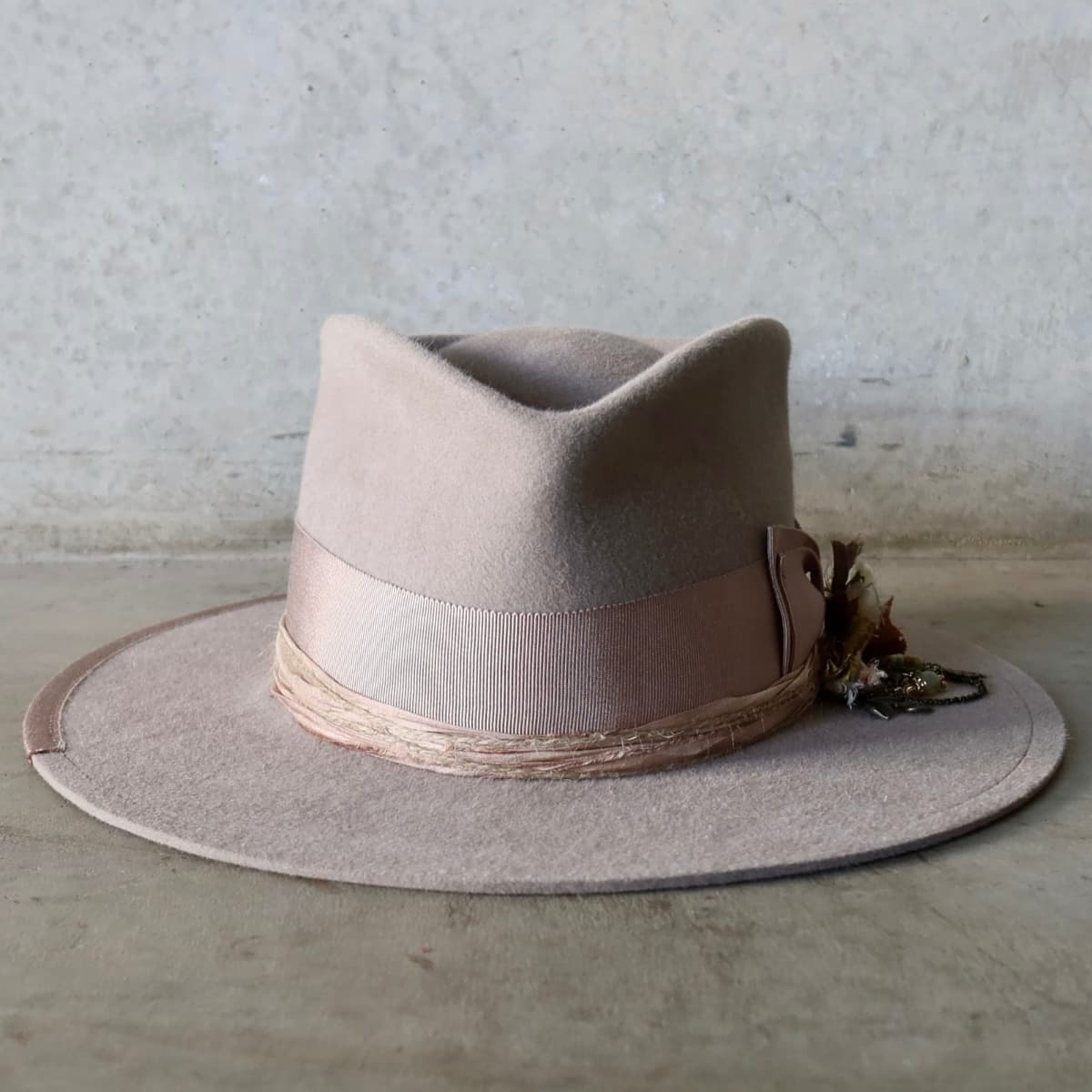Sahara felt hat Huskisson by PHYLLi Designs with antique bronze chunky hat pin featuring sari silks, charms and beads.