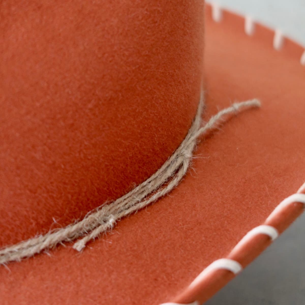Close up detail of the Nevada cowboy hat showing three natural twine wraps around the crown.
