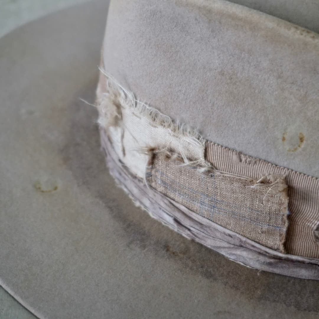 Close up detail of the Oakley Limited Edition felt hat showing sari silk trimming wrapped around the crown.