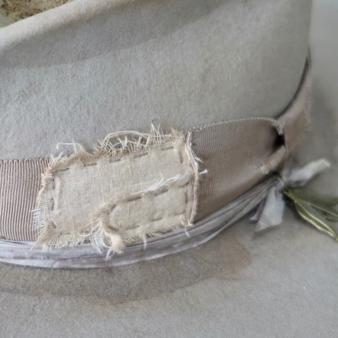 Close up detail of the Oakley Limited Edition felt hat showing distressed linen patch.