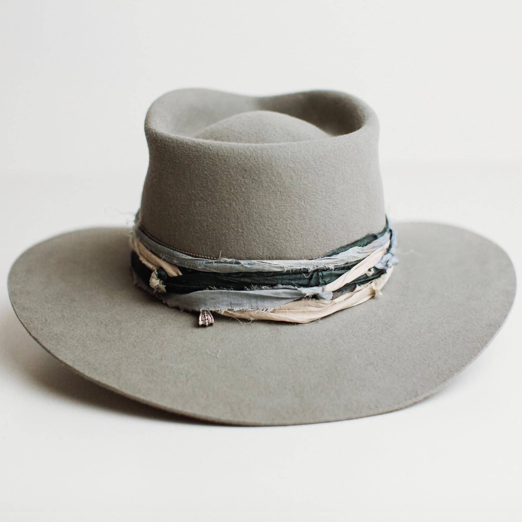 Back view of Santa Fe Winter felt hat by PHYLLi Designs with cement grosgrain band and sari silk trimming.