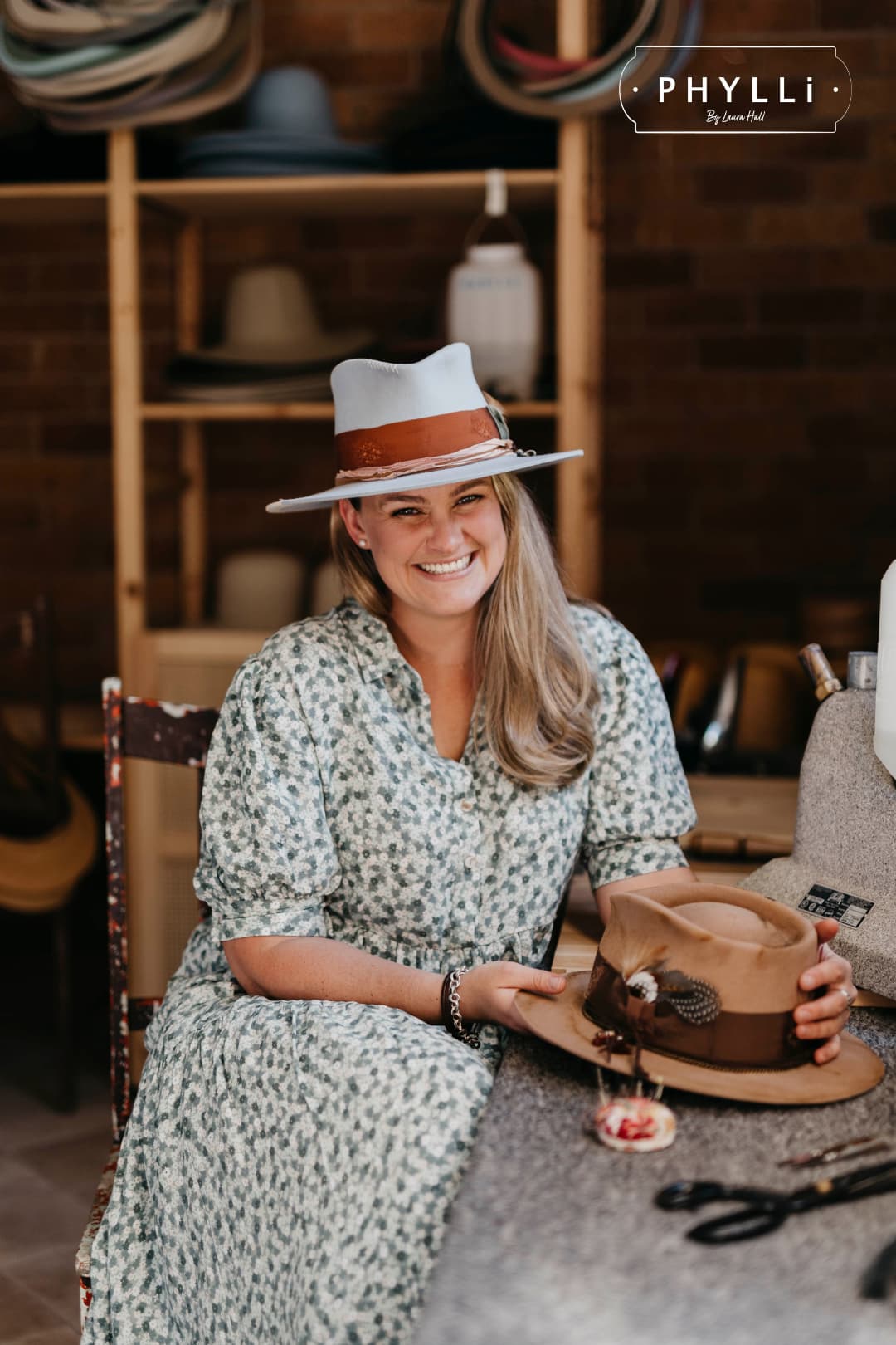 Laura Hall wearing the Santa Monica crystal blue felt hat in the PHYLLi Designs studio.