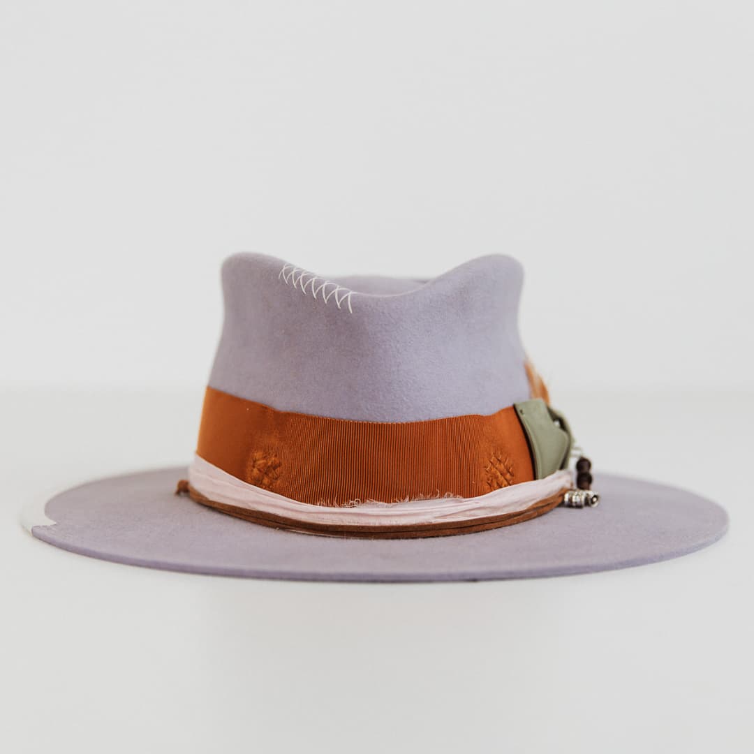 Front view of Santa Monica Lilac felt hat by PHYLLi Designs with rust Japanese grosgrain band, oil green bow and sari silk trim.