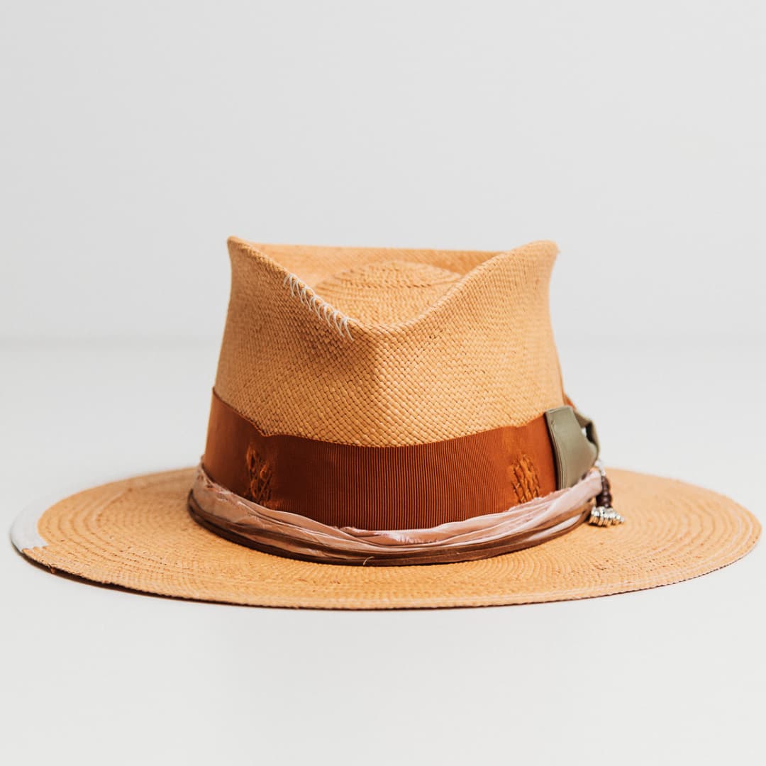 Santa Monica Panama hat in Biscuit with Rust distressed grosgrain band, Oil Green bow and Rose sari silk trim.