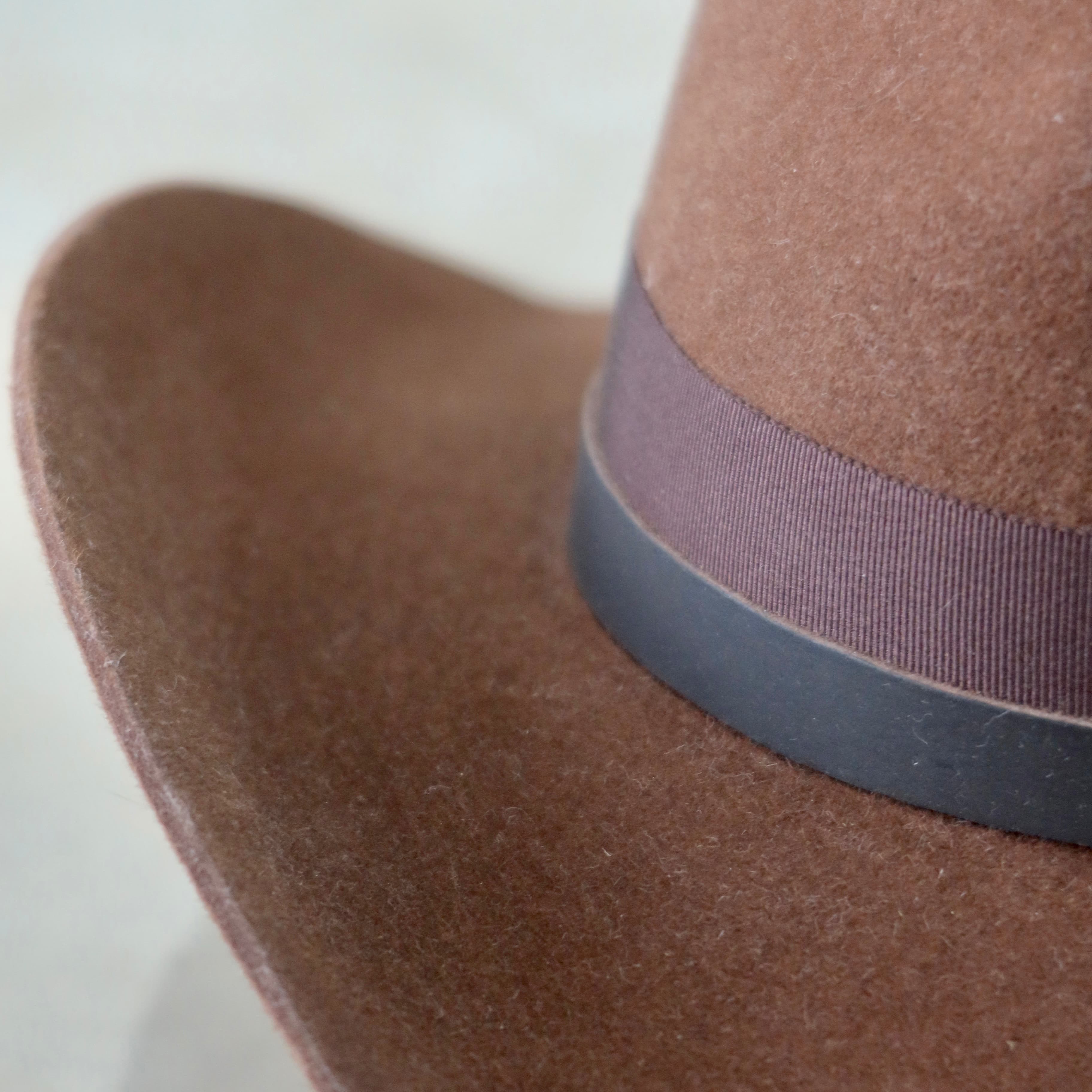 Close up detail of the Spicer cowboy hat showing chocolate Japanese grosgrain and leather bands.