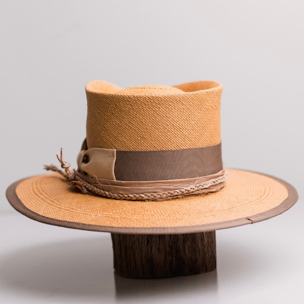 Back view of the Taupetone Biscuit Panama hat by PHYLLi Designs featuring taupe Japanese grosgrain band and taupe grosgrain brim trim.