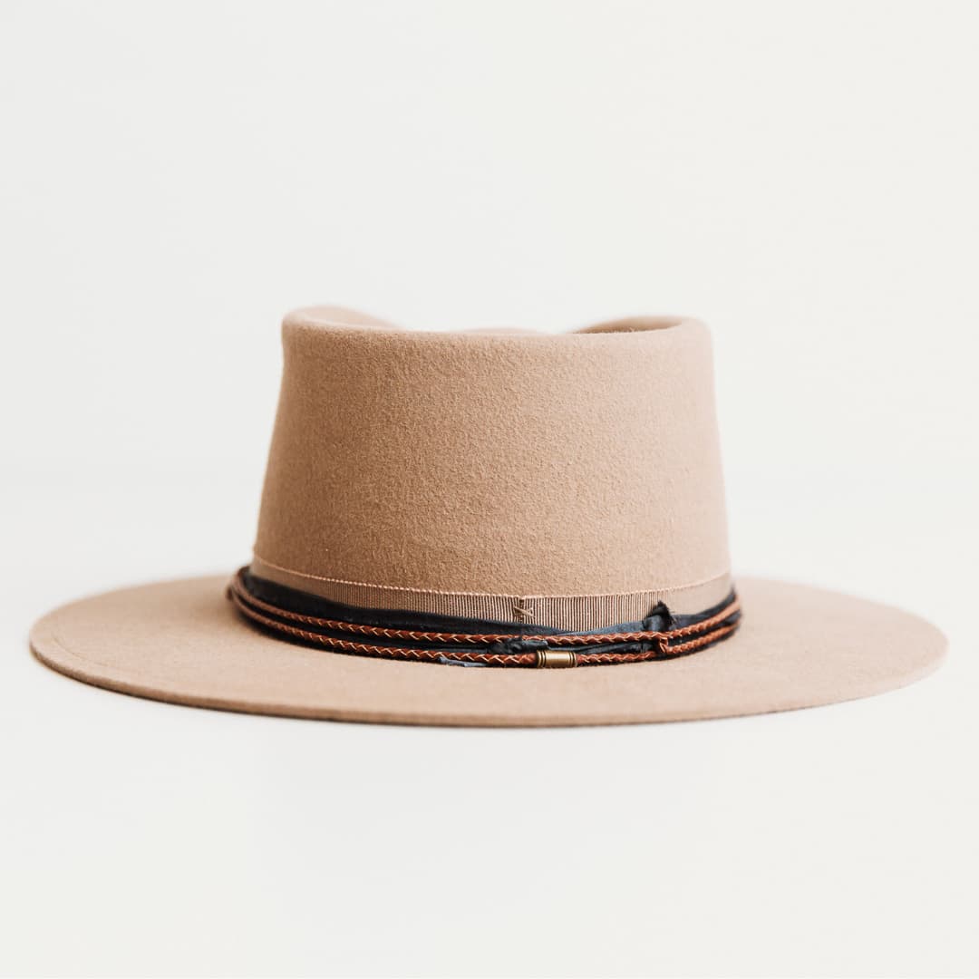 Back view of The Arkle Sahara felt hat by PHYLLi Designs with vintage French grosgrain band and braided leather trim.