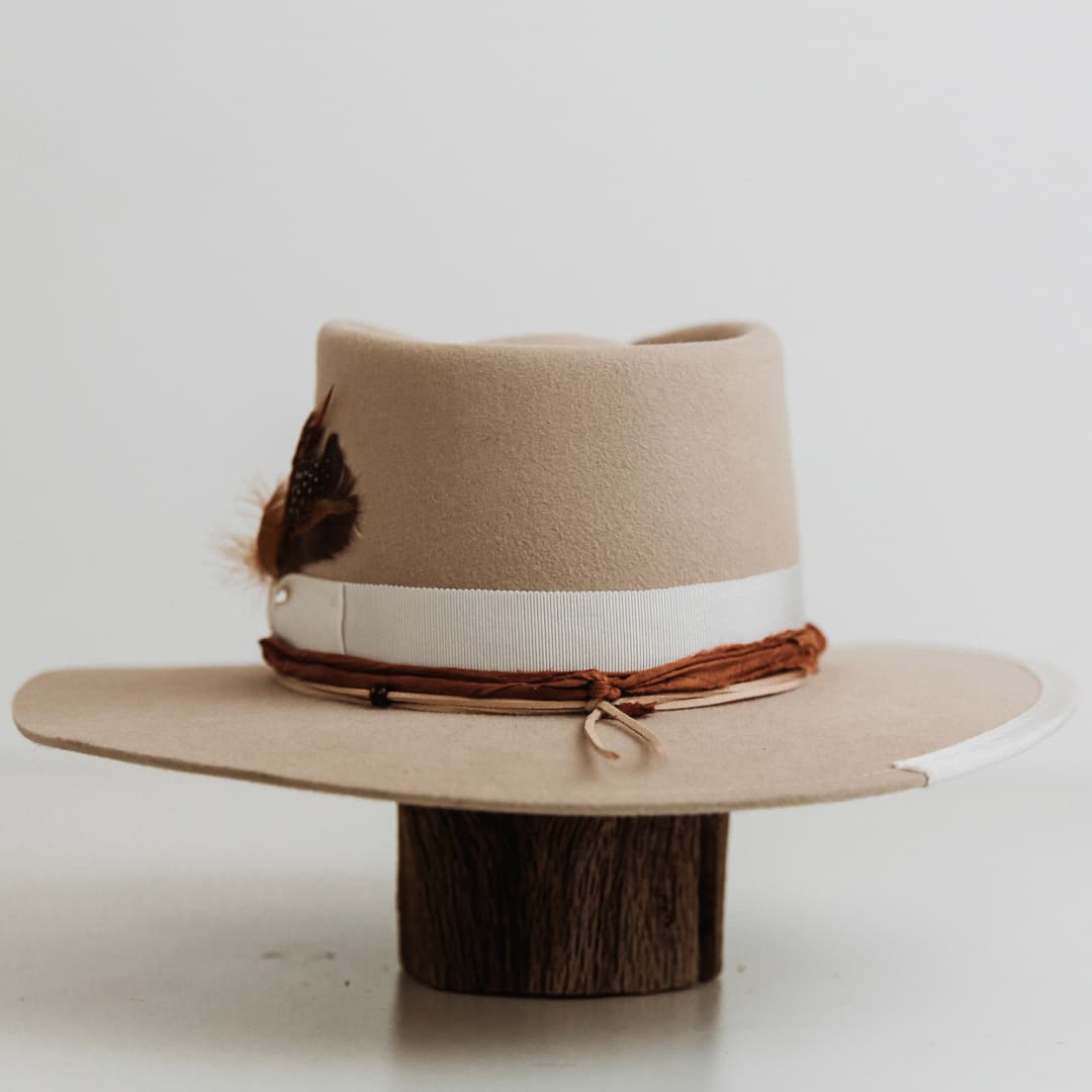 Back view of The Dartbrook beige felt hat with ivory grosgrain band and brim stitch.
