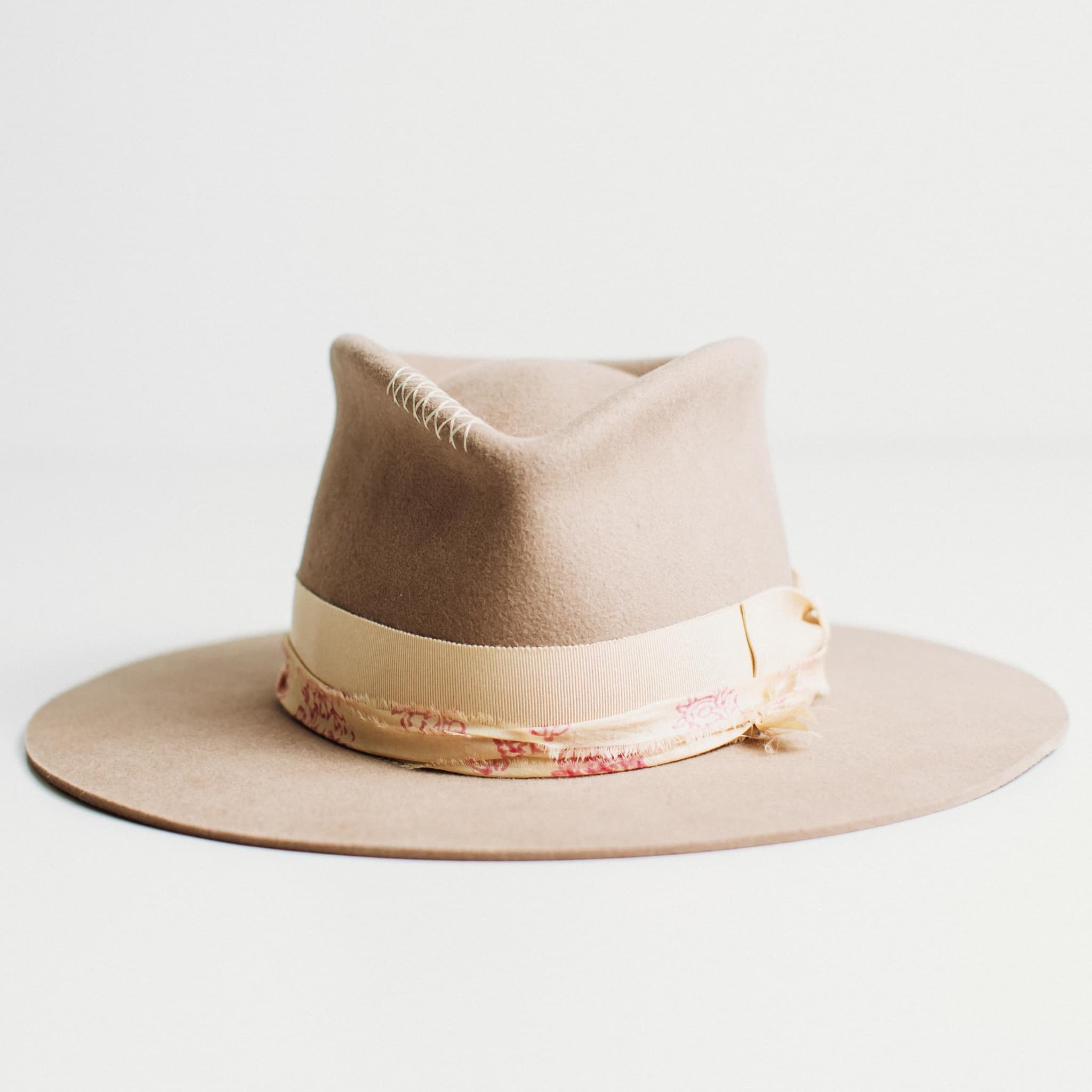The Fawn sahara felt hat with Japanese grosgrain bow band and sand and pink patterned sari silk trim by PHYLLi Designs.