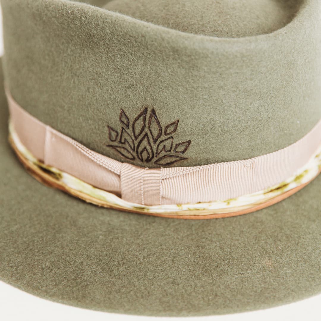 Close up of burnt branded lotus pattern on The Lotus Military felt hat by PHYLLi Designs.