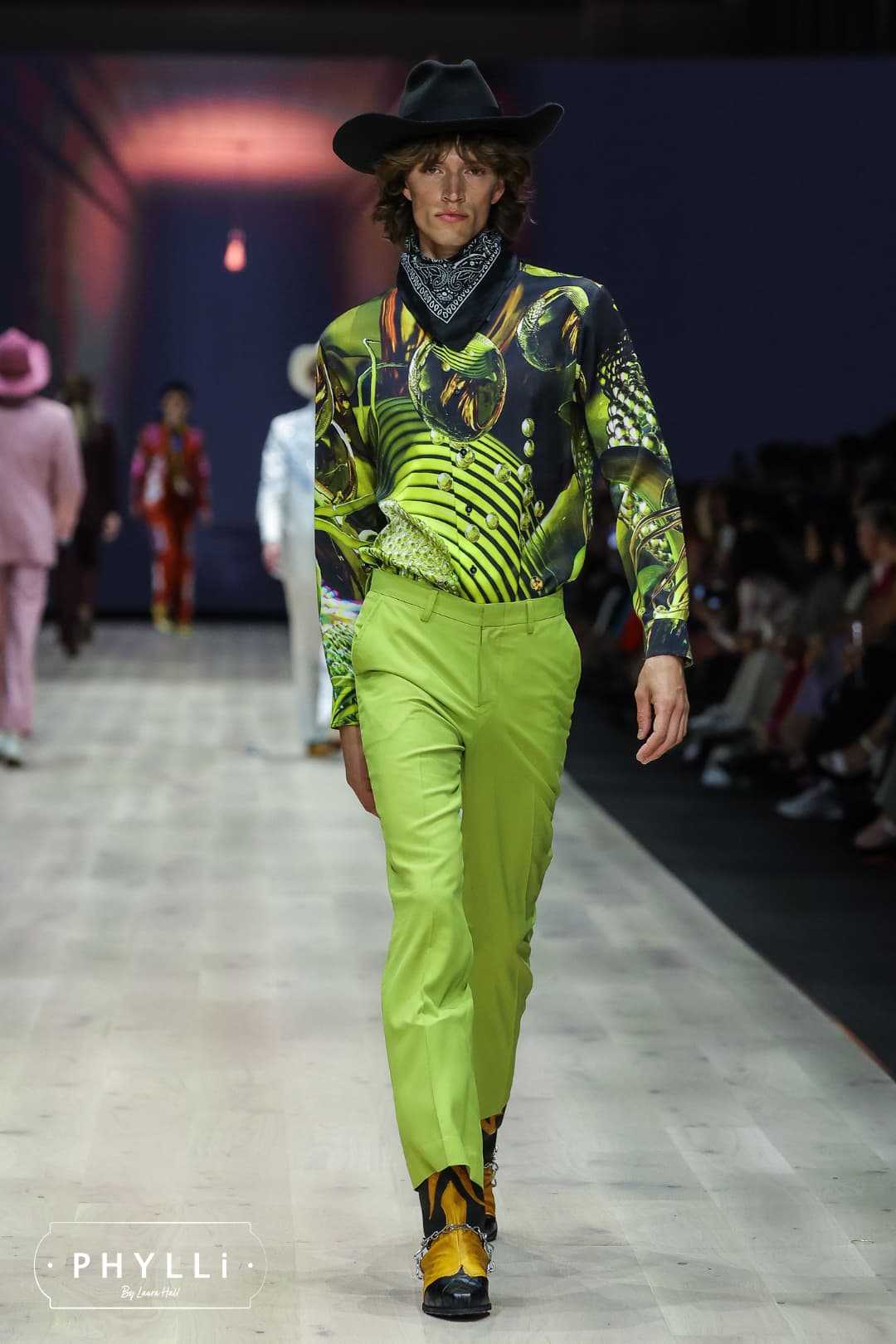 Male runway model wearing The Plains black felt cowboy hat by PHYLLi Designs styled with contemporary fashion look.
