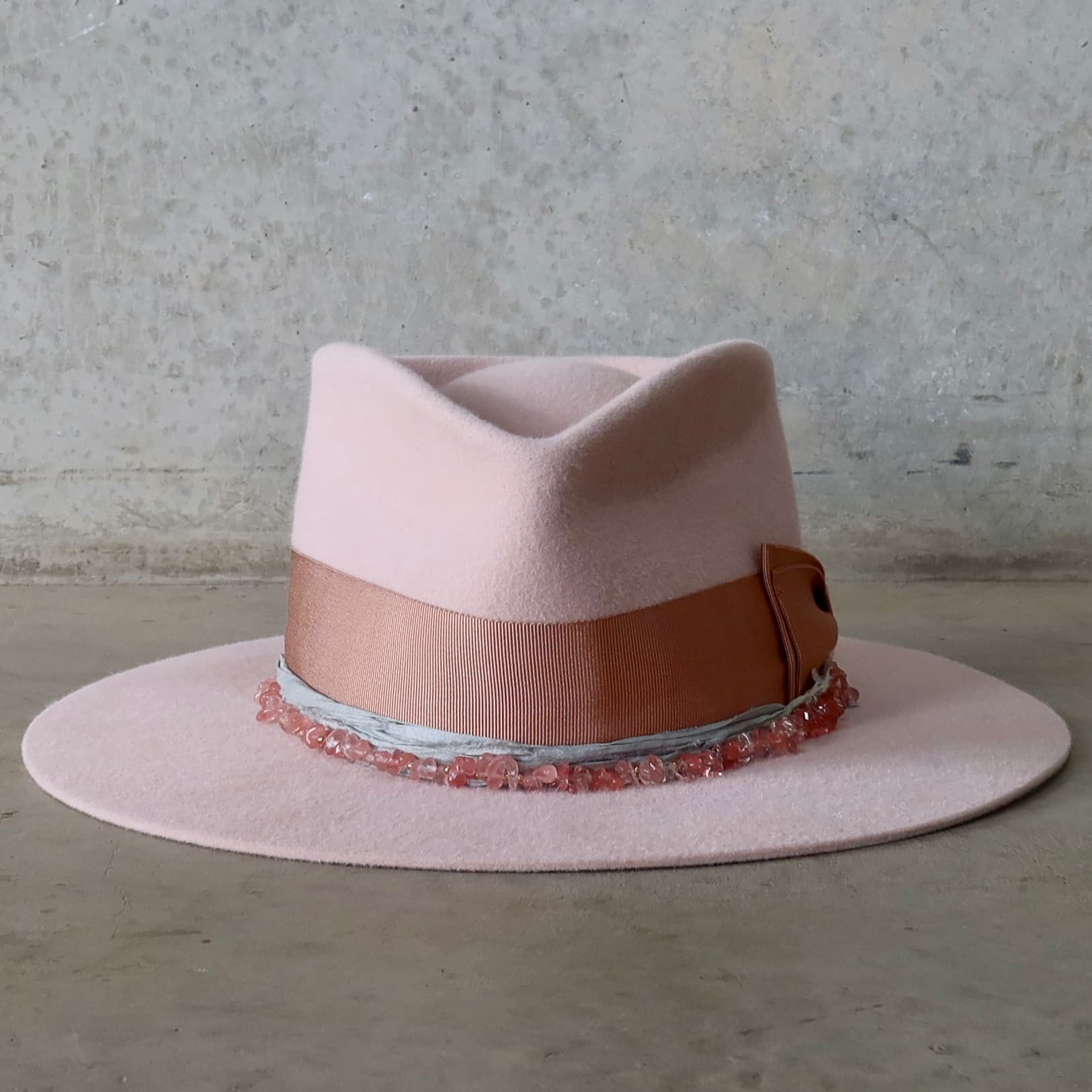 Tourmaline Baby Pink felt hat by PHYLLi Designs with dirty rose Japanese grosgrain double bow band and rose quartz hat necklace with ocean sari silk trim.