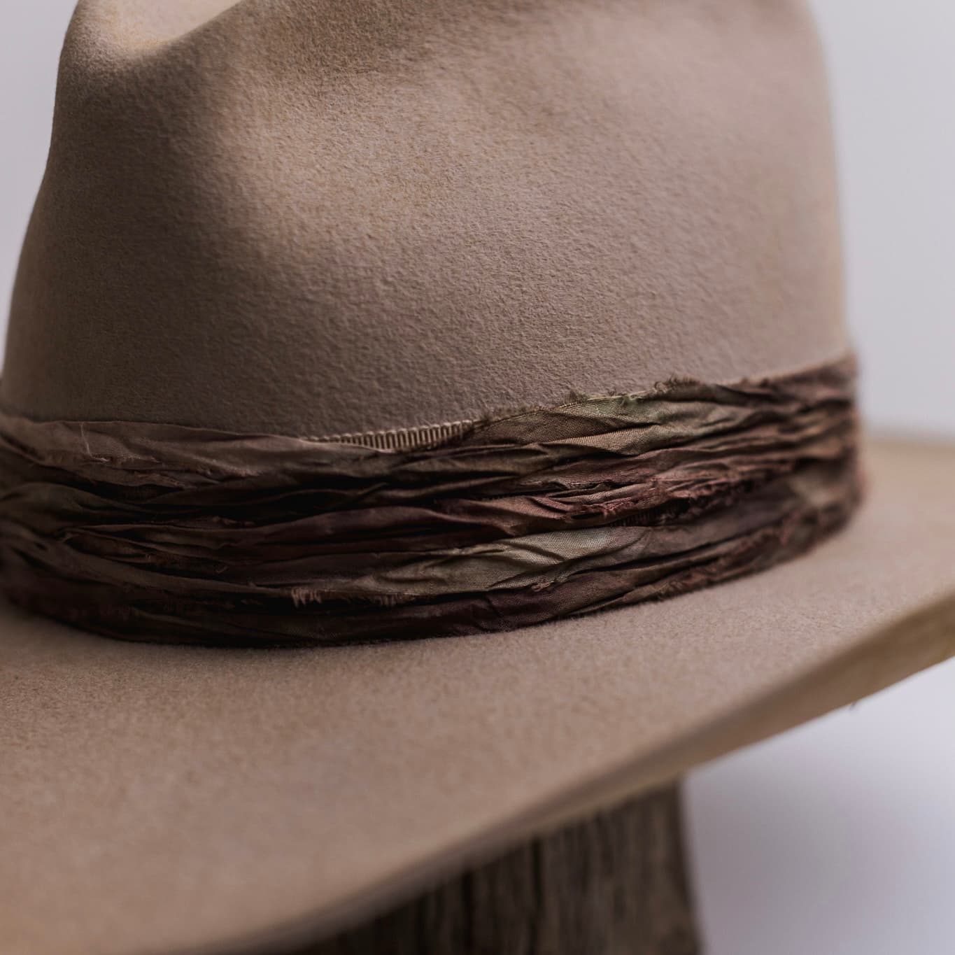 Close up detail of the Wrapped Wheeler Sahara cowboy hat showing tonal tie dye sari silk wrapped trimming.