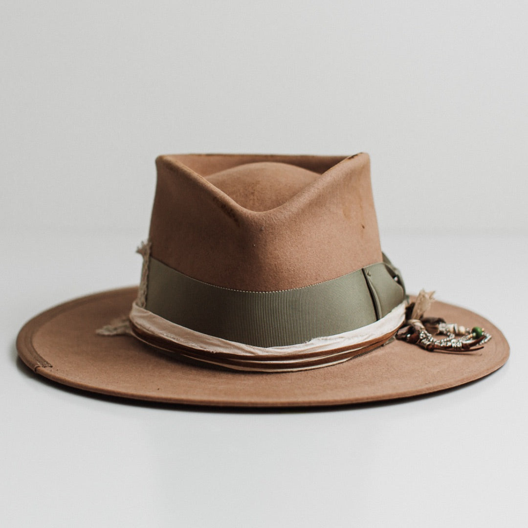 Nim camel distressed felt hat by PHYLLi Designs with oil green Japanese grosgrain bow band, sari silk trimming and chunky silver hat pin.